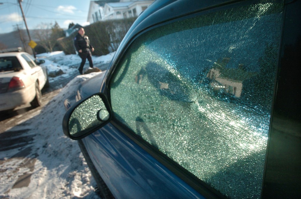 Vyto Starinskas / Staff PhotoOne of the many car windows that were smashed or broken last night in Rutland. 